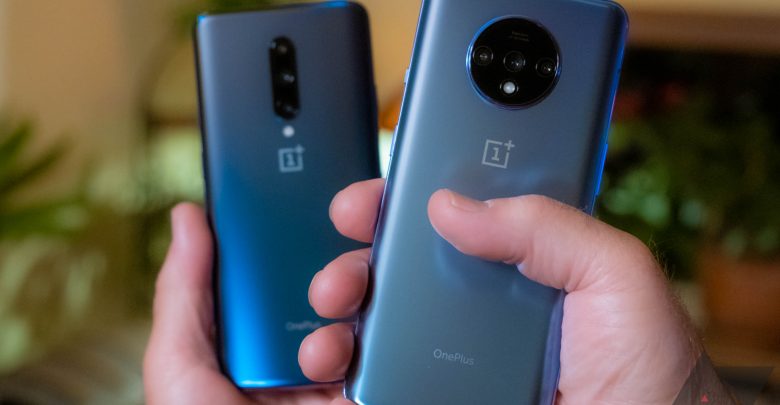 OnePlus 7T with 7 Pro in hands