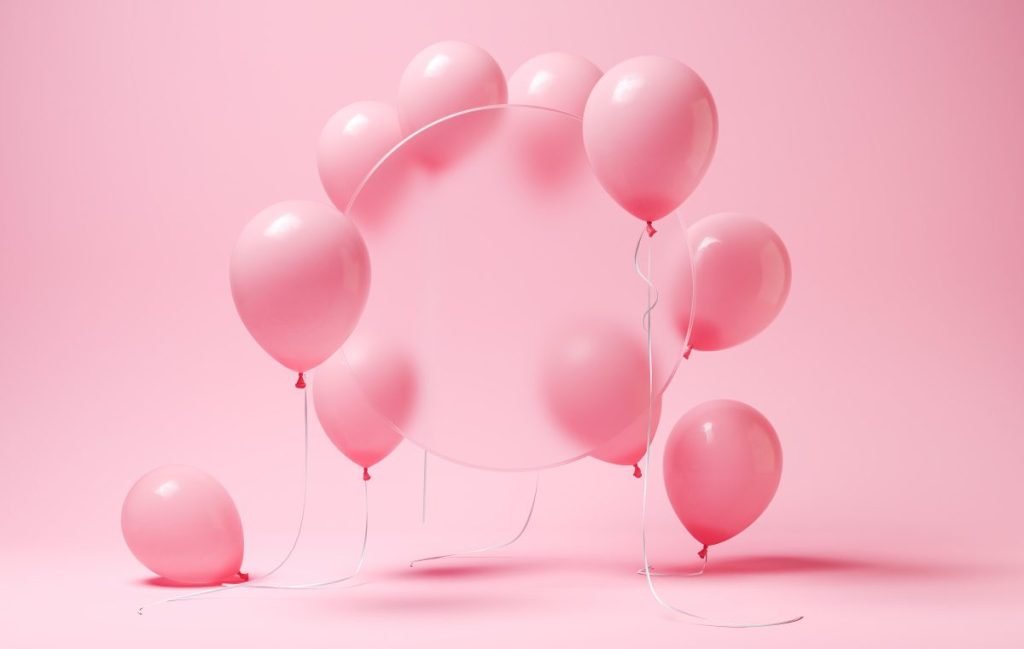 pink balloons with blurry circle